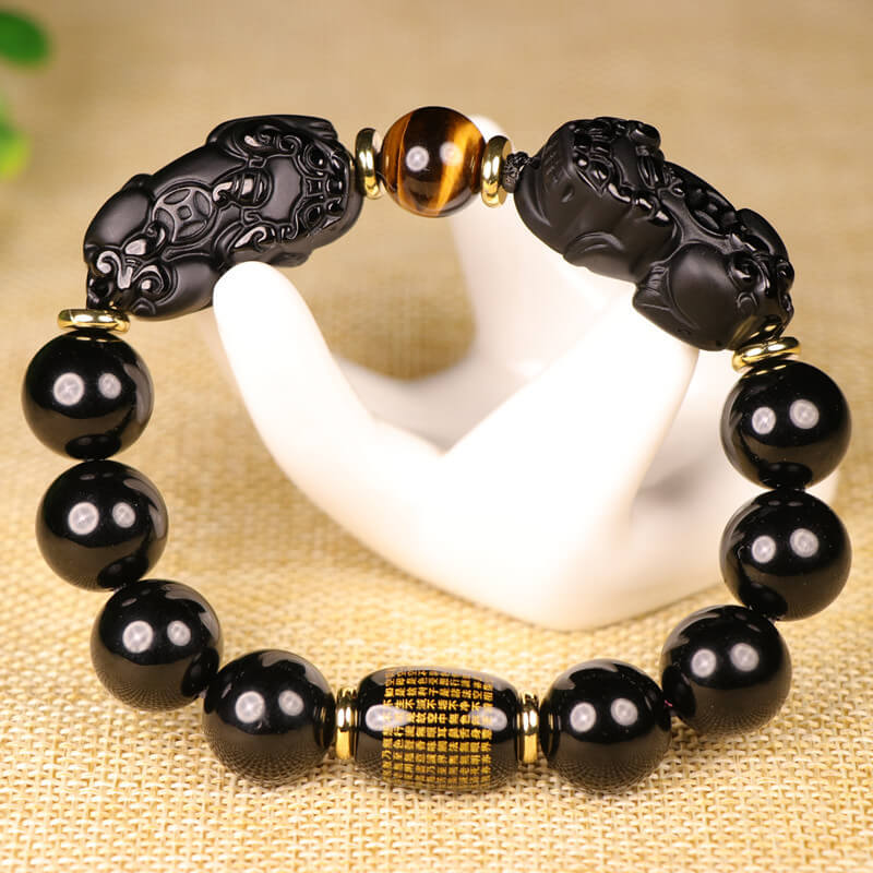Elastic Black Obsidian Pixiu Bracelet with tiger eye showing cultural design and volcanic glass beauty