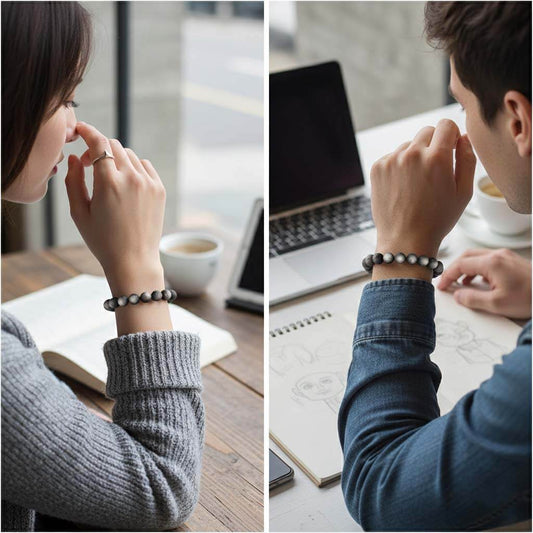 Person wearing affordable matte black obsidian protection bracelet in casual daily setting - budget-friendly crystal jewelry for students