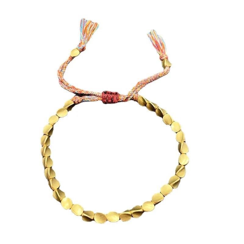 Adjustable sliding knot copper bracelet laid flat, showcasing craftsmanship and fine detail
