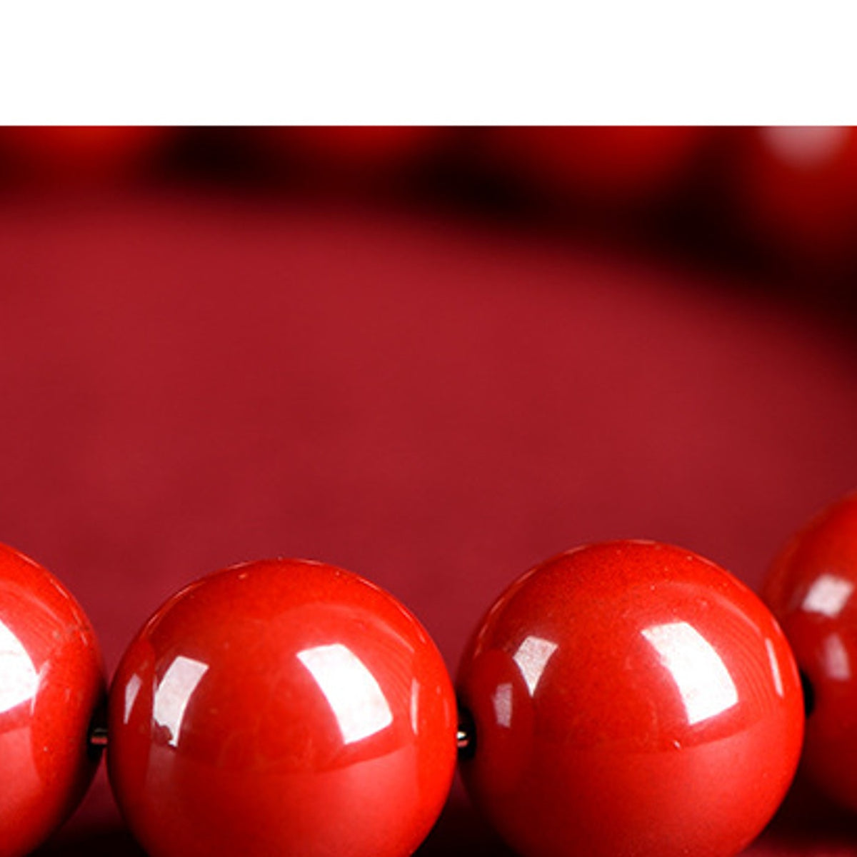 Texture detail of red cinnabar style bracelet beads