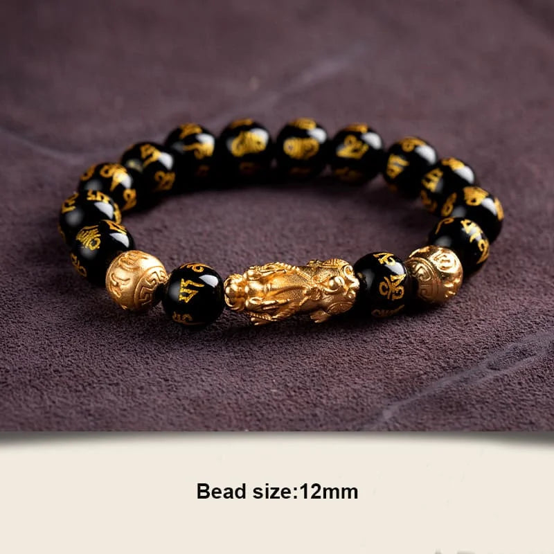 Pixiu bracelet under soft lighting emphasizing obsidian’s protective and grounding properties