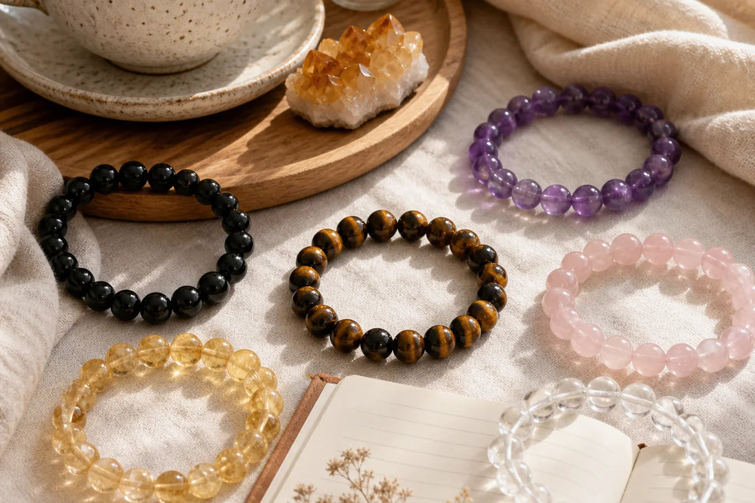 Crystal bracelets arranged with morning tea and journal for choosing the best time to wear crystal jewelry