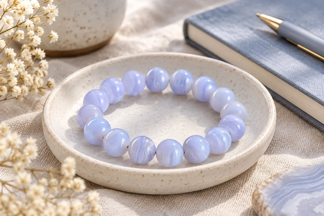 Blue lace agate bracelet guide with pale blue banded beads in a calm lifestyle scene