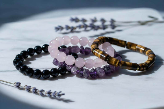 How to charge crystals with moonlight - natural crystal bracelets on marble surface