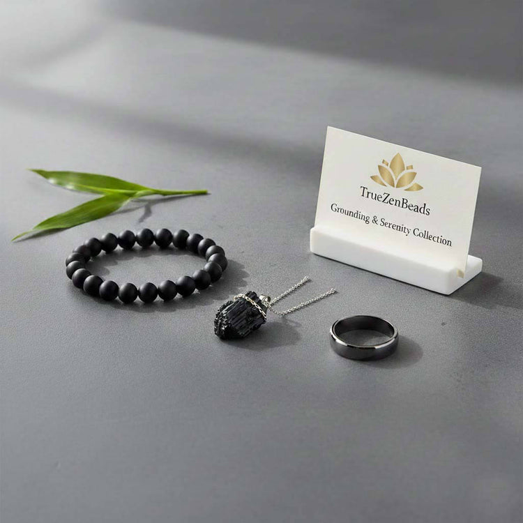 A curated collection of TrueZenBeads handcrafted grounding jewelry, featuring natural black obsidian, black tourmaline, and polished hematite, designed for a minimalist and serene lifestyle.