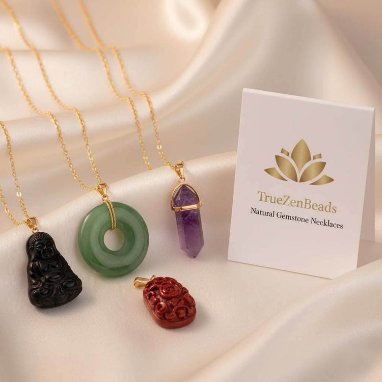 TrueZenBeads collection of handcrafted natural gemstone necklaces and pendants featuring obsidian, jade, quartz, amethyst, and various artisan-carved minerals.