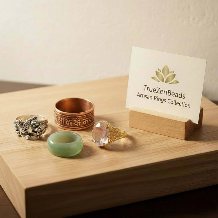 TrueZenBeads collection of handcrafted rings in various materials including sterling silver, copper, and natural gemstones with traditional cultural motifs.