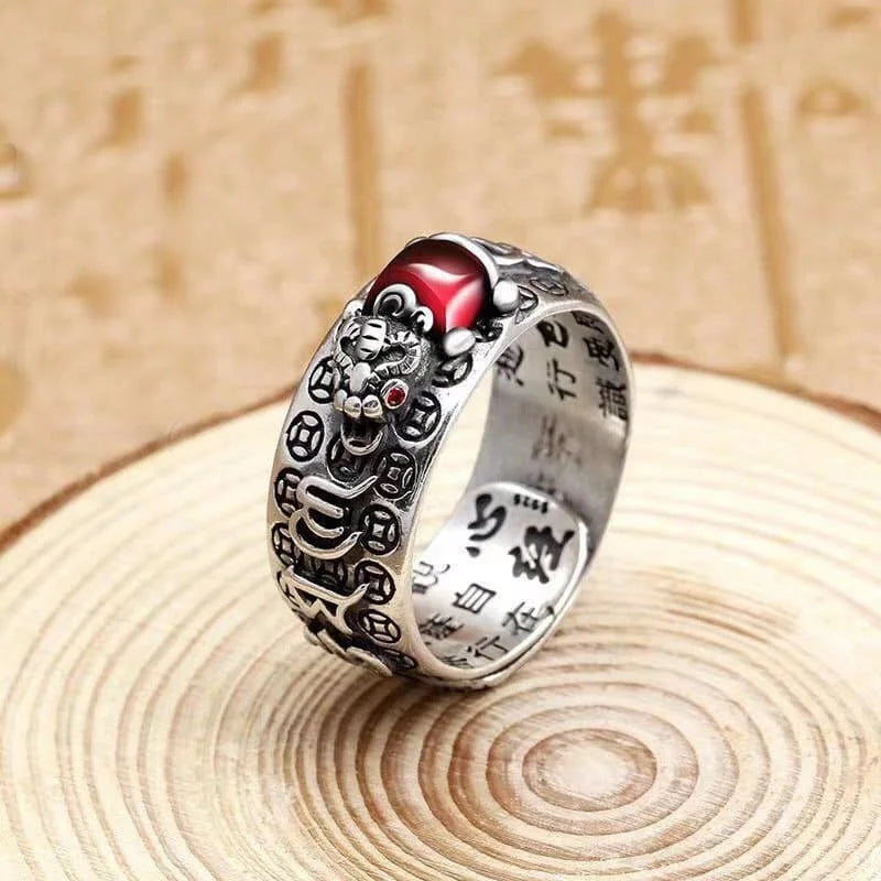 Natural garnet ring featuring Pixiu charm for prosperity and abundance
