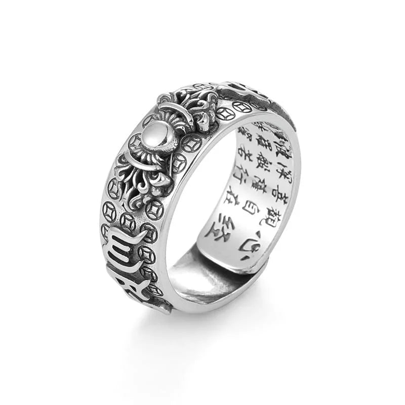 Macro shot of mantra details on Pixiu ring channeling abundance and protection
