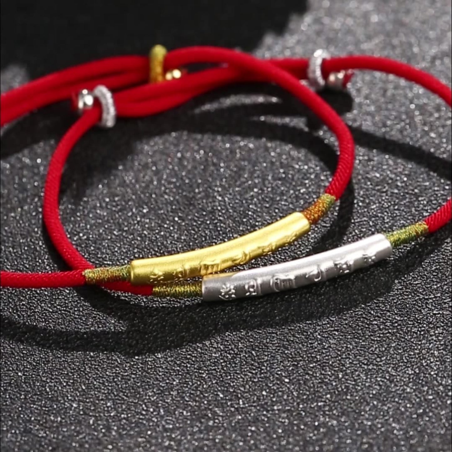 TrueZenBeads Tibetan red string bracelet featuring gold or silver mantra engraving, front view showing design and craftsmanship