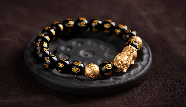 Mantra-inscribed Pixiu Feng Shui bracelet combining ancient symbols with modern style