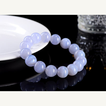 Blue lace agate bead bracelet on black reflective display