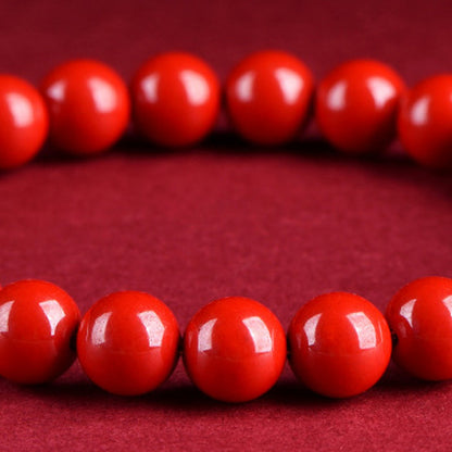 Cinnabar style red beaded stretch bracelet in 95 imperial red sand style