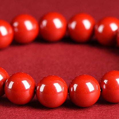 Cinnabar style glossy red beaded stretch bracelet in 97 imperial red sand style