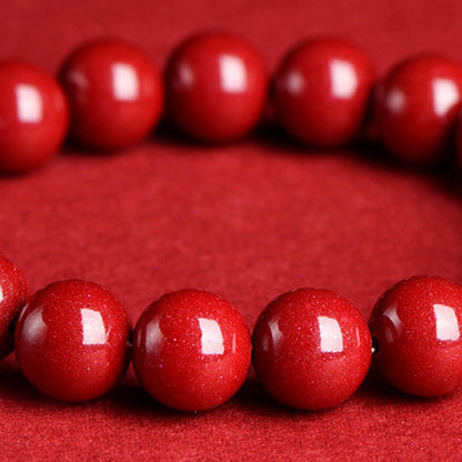Cinnabar style red beaded stretch bracelet in 97 purple gold sand style