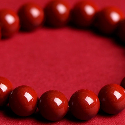 Cinnabar style red beaded stretch bracelet in 50 purple sand style