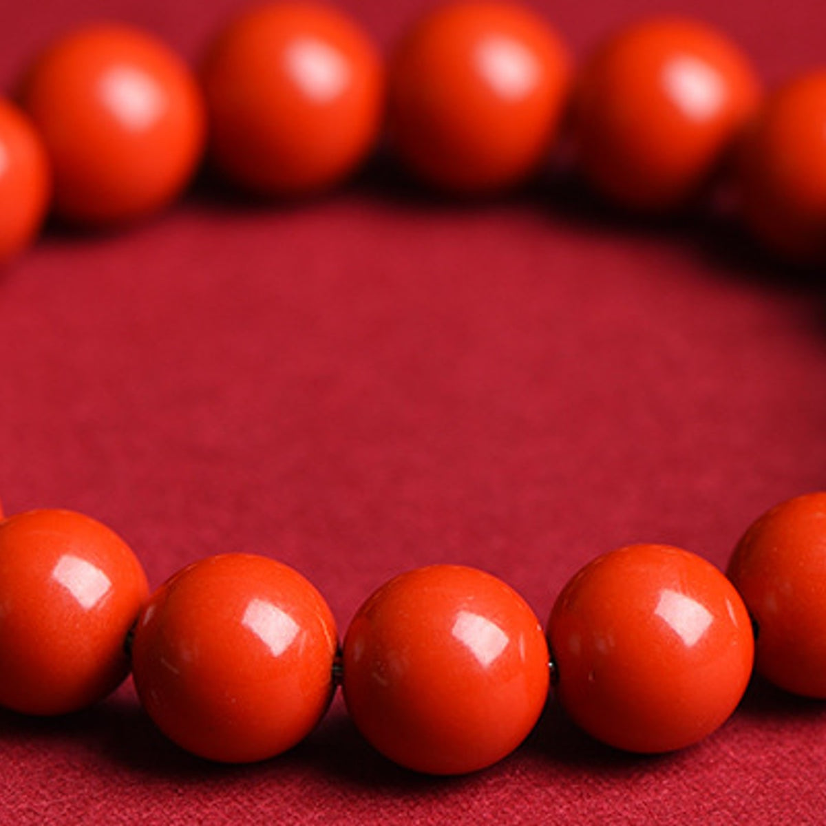 Cinnabar style bright red beaded stretch bracelet in 50 red sand style