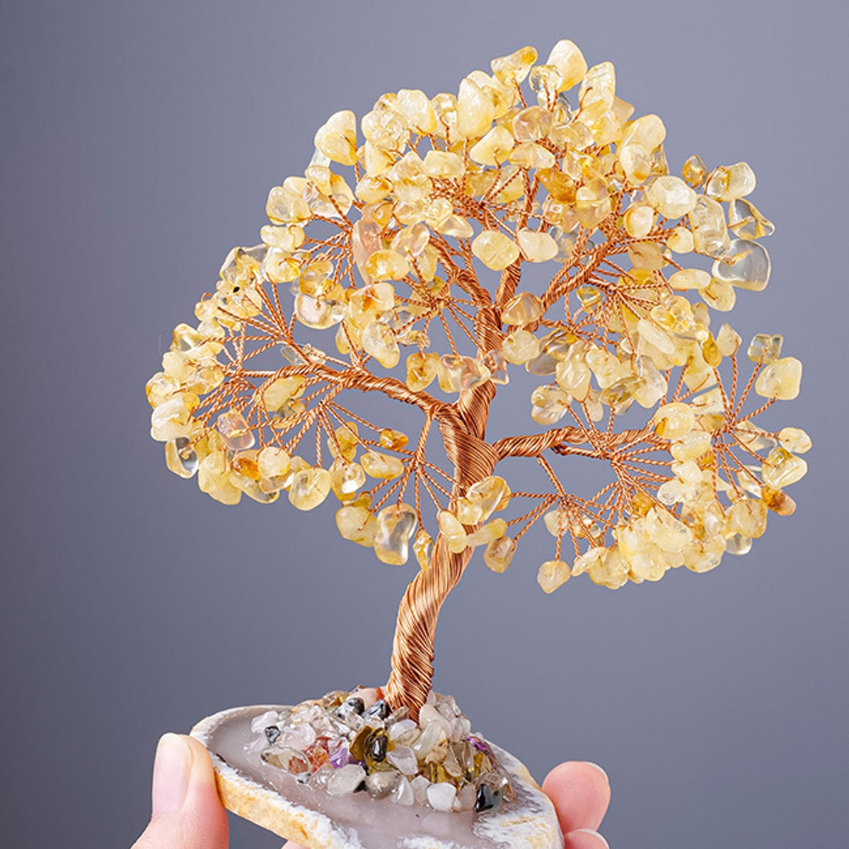 Handheld size view of citrine crystal tree decor