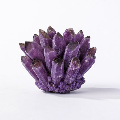 Deep purple amethyst crystal cluster decor on white background