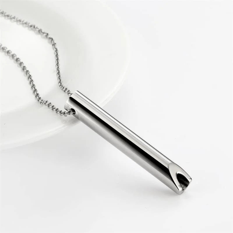 Woman wearing TrueZenBeads breathing tool necklace for calm and meditation