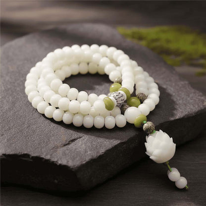 Elastic Bodhi Mala bracelet showing 108 beads wrapped multiple times for multi-wrap wearing style