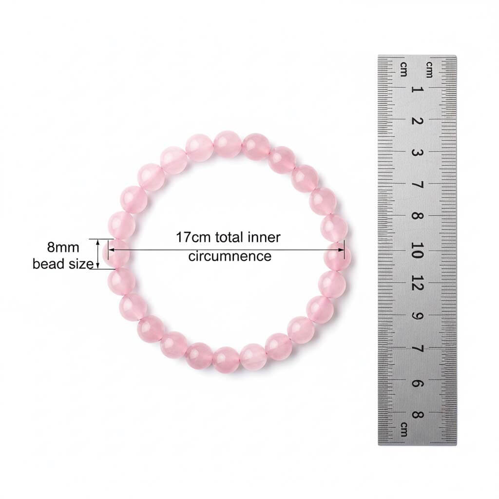 Elastic Grapefruit Rose Crystal Bracelet showing 8mm bead size with warm pink tones