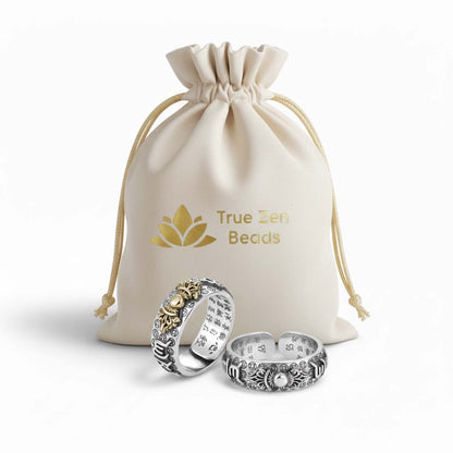 Hand-carved Pixiu ring displayed in TrueZenBeads branded gift bag packaging - traditional script motif jewelry ready for gifting