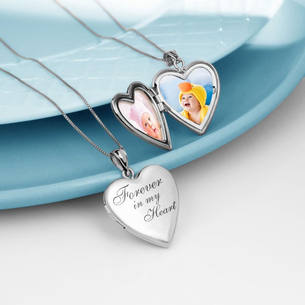 Heart locket necklace opened to show photo compartment detail