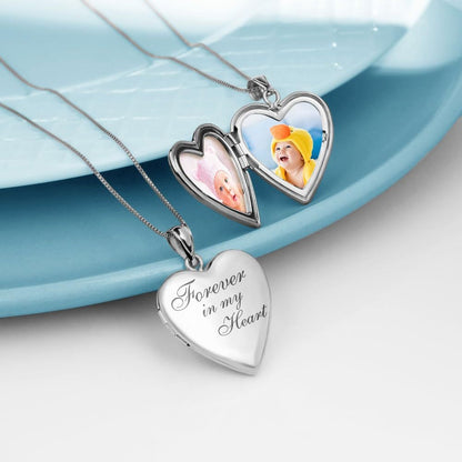 Heart locket necklace opened to show photo compartment detail