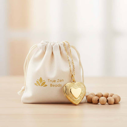 Heart photo locket necklace displayed in TrueZenBeads branded gift bag packaging - engraved stainless steel personalized jewelry ready for gifting