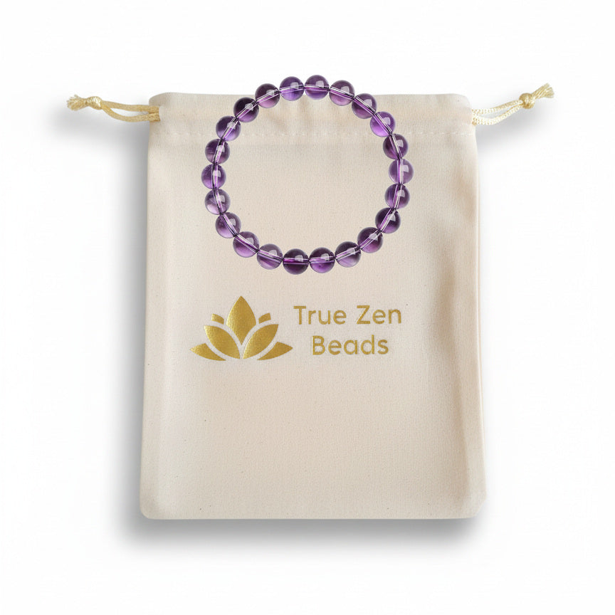 Light purple amethyst bracelet displayed with a True Zen Beads branded cotton pouch