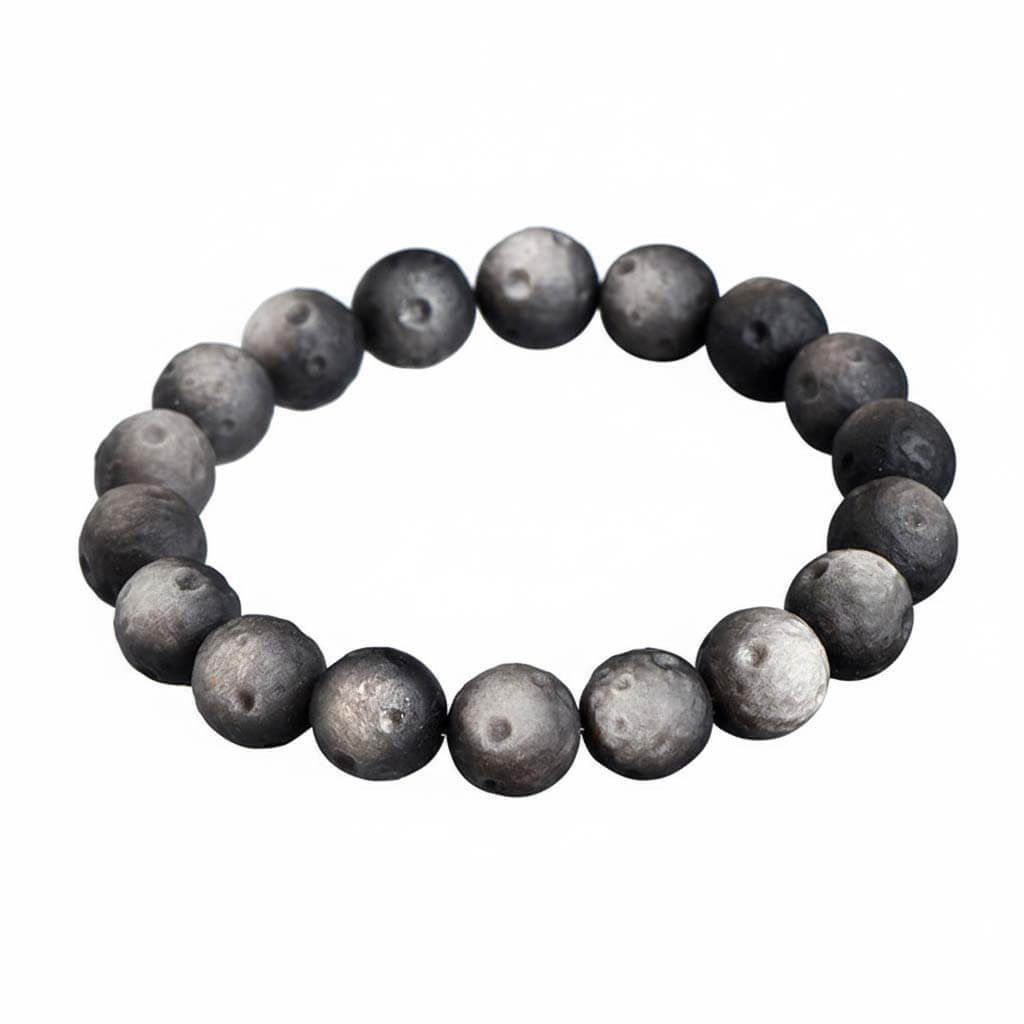 Matte black obsidian bracelet with smooth frosted finish on white background - affordable protection crystal for beginners under 100 dollars