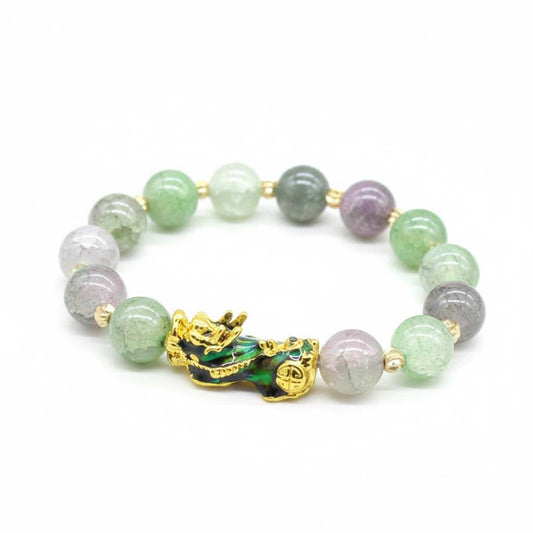 Color-changing Pixiu bracelet with mixed synthetic thermochromic beads in green, purple and white showing temperature-sensitive technology and gold-plated enamel charm