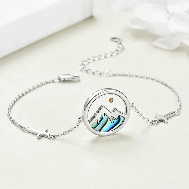 Mustard seed mountain bracelet with silver chain and small cross accents