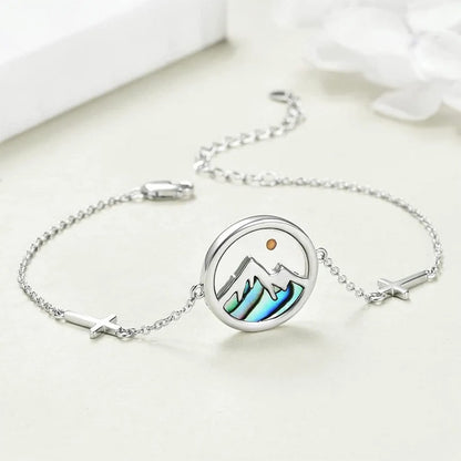 Mustard seed mountain bracelet with silver chain and small cross accents