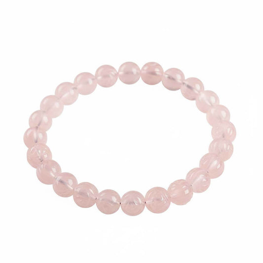 Natural Rose Quartz Bracelet with grapefruit pink crystal beads showing warm peachy tones