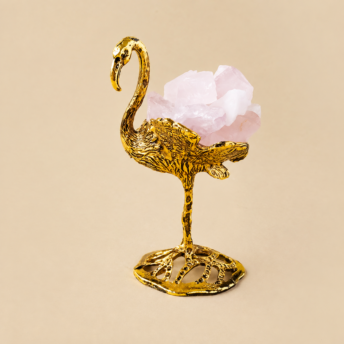 Natural rose quartz swan figurine with gold-tone display base