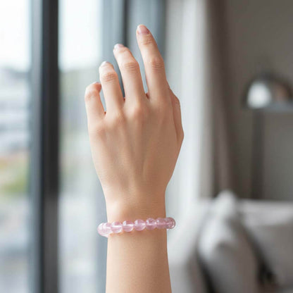 Woman wearing Pink Quartz Crystal Bracelet for elegant daily lifestyle with self-love