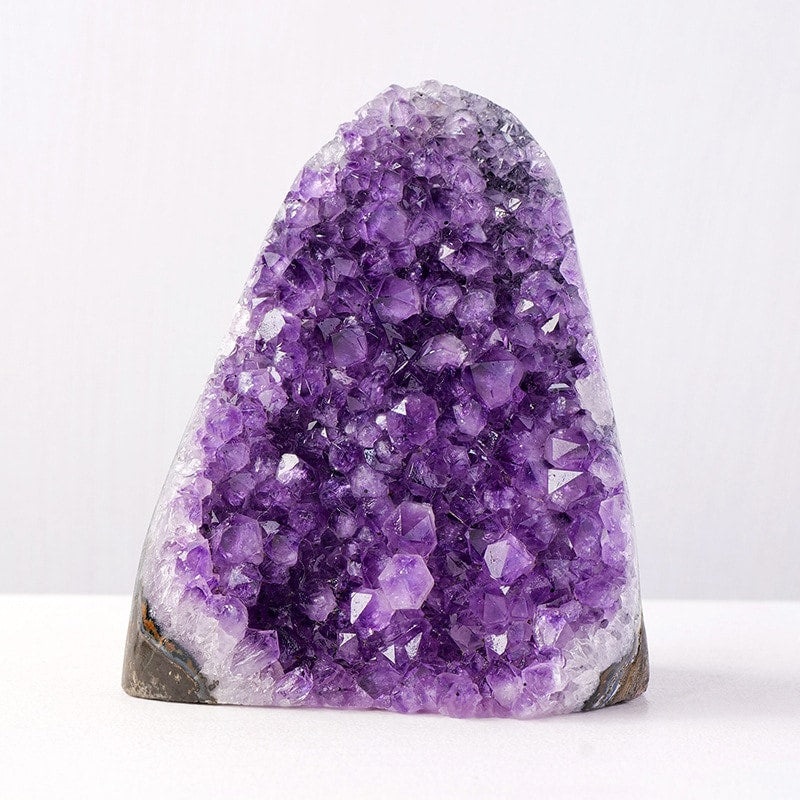 Premium amethyst geode decor with purple crystal points
