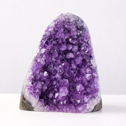 Premium amethyst geode decor with purple crystal points