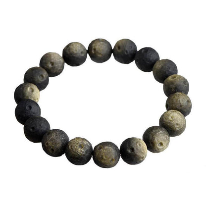 Raw gold sheen obsidian bracelet with natural matte unpolished texture on white background - authentic wealth protection stone for men