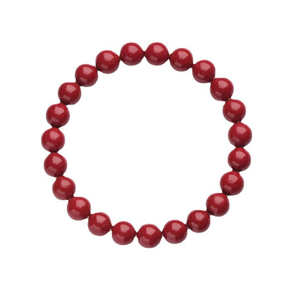 Red cinnabar style beaded stretch bracelet on a clean white background