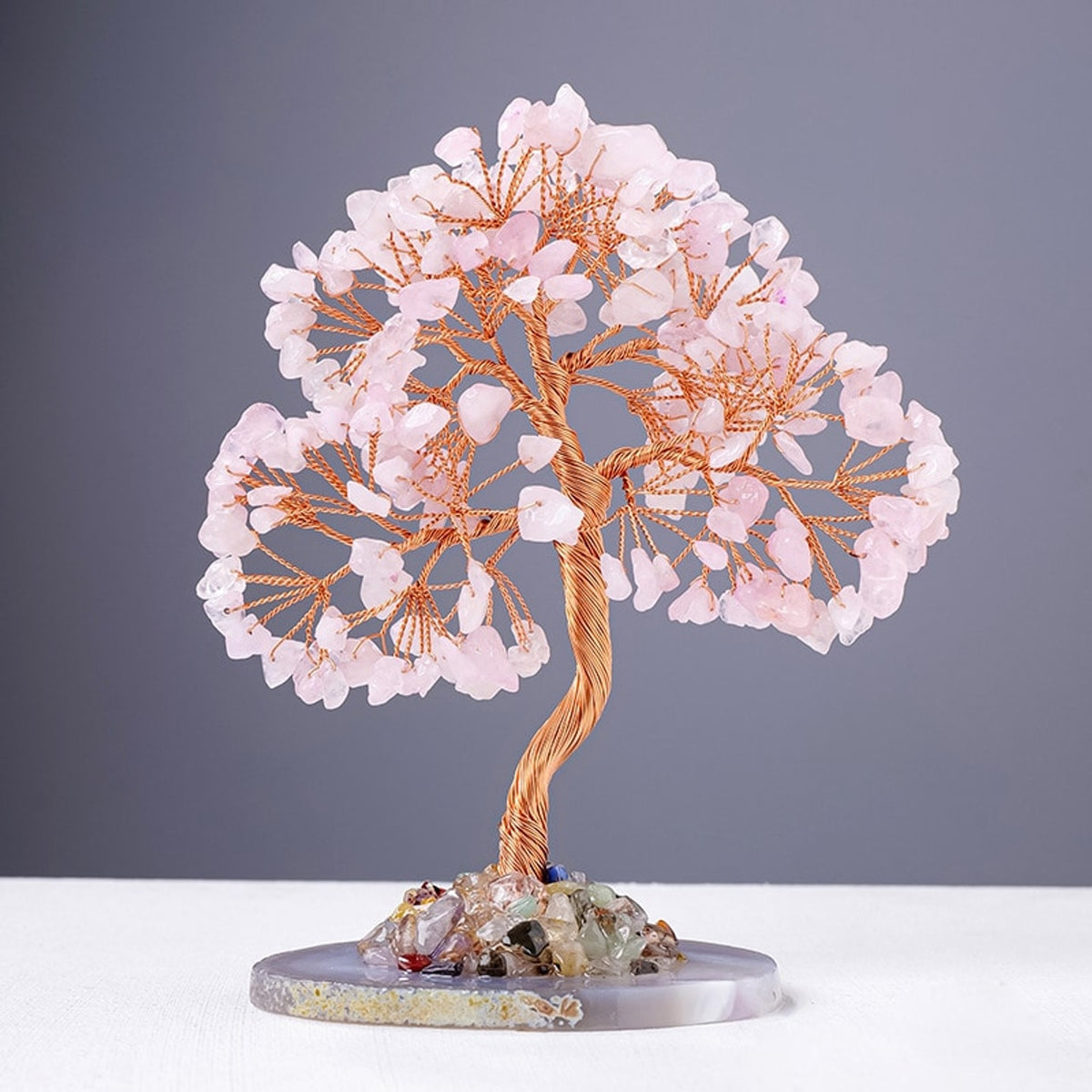 Rose quartz crystal tree decor with soft pink gemstone chips