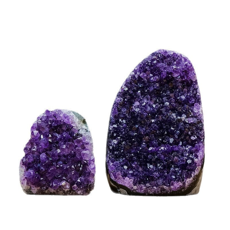 Small and large amethyst geode display pieces