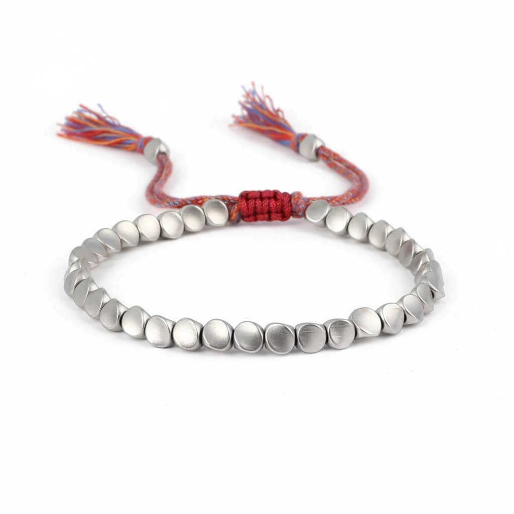 Handmade Tibetan metal beads bracelet in silver tone with colorful braided cord and decorative tassels