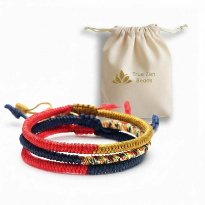 Tibetan Endless Knot Bracelet displayed in TrueZenBeads branded gift bag packaging - traditional Buddhist cultural jewelry ready for gifting