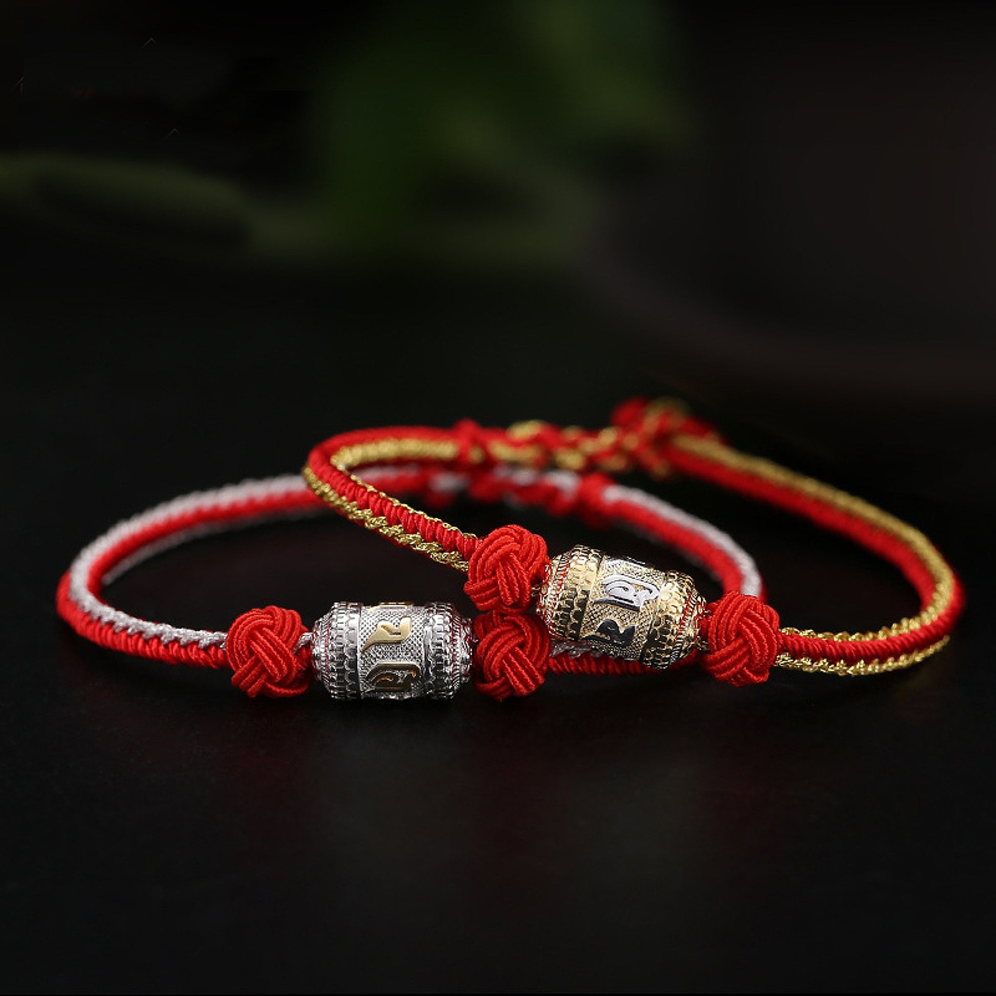 Handmade Tibetan bracelet with traditional knot and metal beads