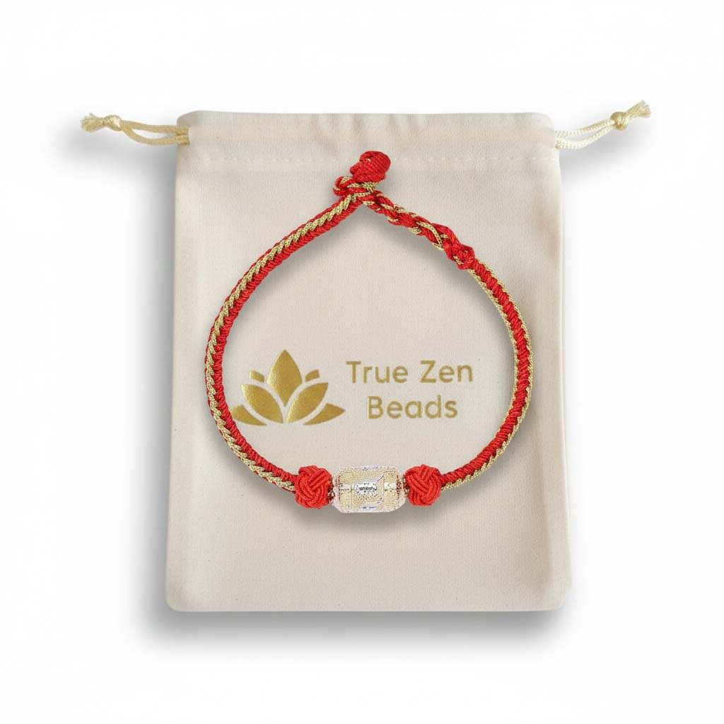 Tibetan Red Rope Prayer Wheel Bracelet in TrueZenBeads branded gift bag packaging - Buddhist cultural heritage jewelry ready for gifting