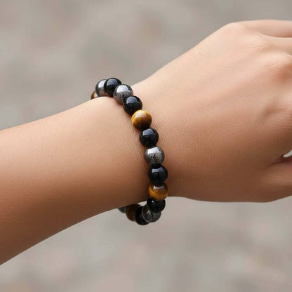 Tiger eye magnetic stone bracelet worn on wrist showing comfortable fit and natural color contrast between three gemstones