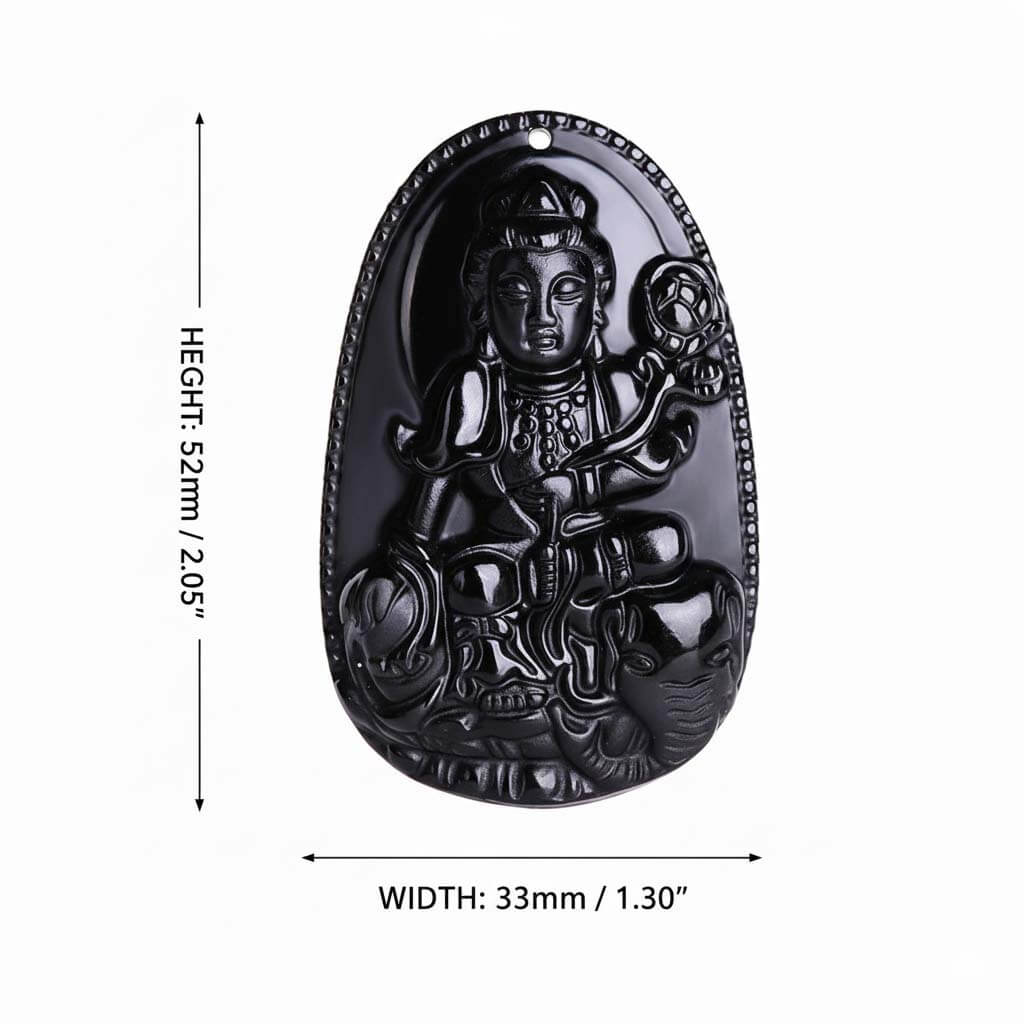 Volcanic Glass Pendant size comparison next to ruler showing 52mm height and 33mm width dimensions